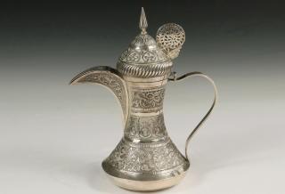 Appraisal: IRANIAN PERSIAN SILVER PITCHER A Dallah or traditional Arabic coffeepot