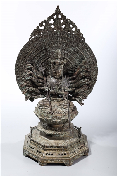 Appraisal: Chinese bronze thousand armed Buddha seated with mandorla x x