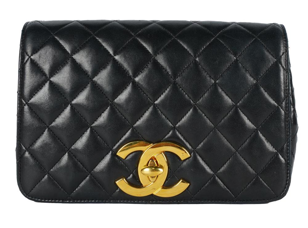 Appraisal: CHANEL QUILTED BLACK LEATHER PURSE HANDBAGgold-tone hardware burgundy leather lining