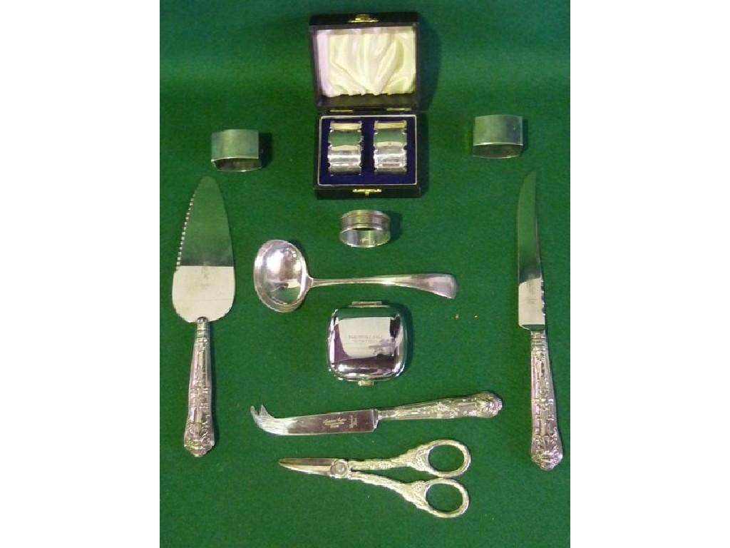 Appraisal: An interesting collection of silver items including a boxed pair