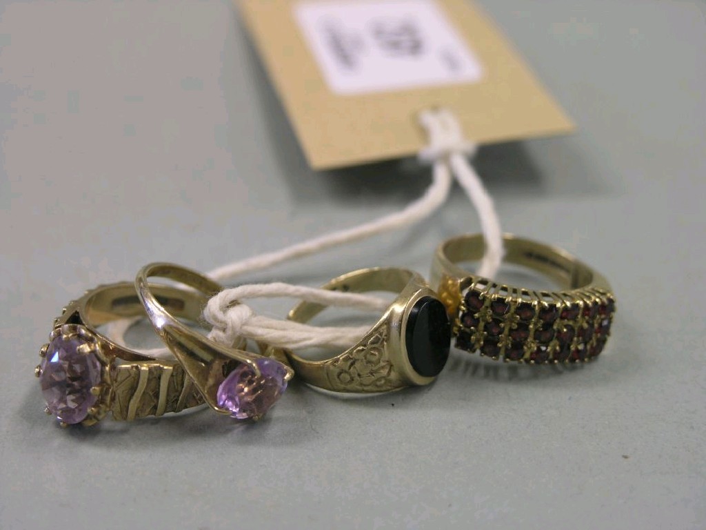 Appraisal: A ct gold and garnet dress ring one other ct