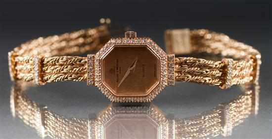 Appraisal: Baume and Mercier K yellow gold and diamond lady's bracelet-watch