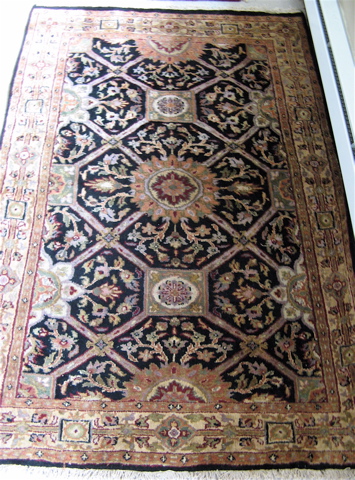 Appraisal: HAND KNOTTED ORIENTAL AREA RUG Indo-Persian central medallion floral and