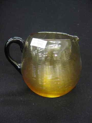 Appraisal: Durand Art Glass Pitcher topaz threadedbody applied black handle ''