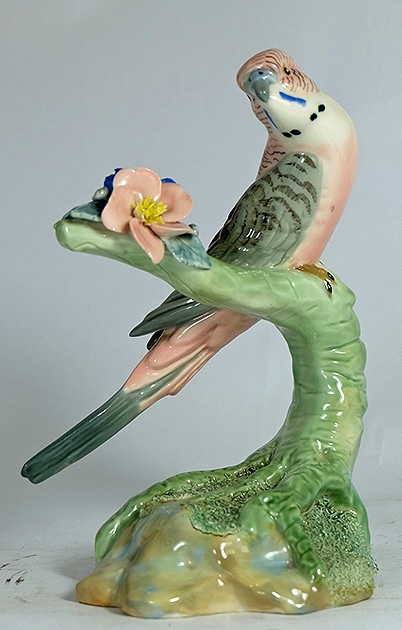 Appraisal: Wade underglaze model of a Budgerigar on floral branch modeled