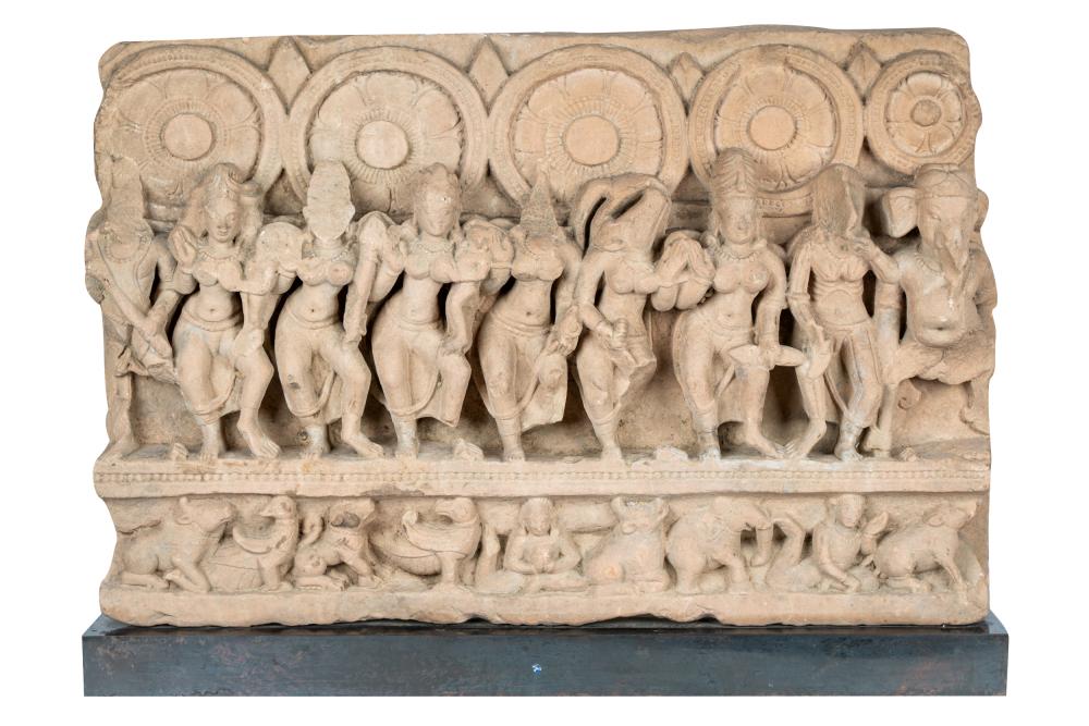 Appraisal: INDIAN CARVED STONE STELEmounted to a wooden plinth inches wide