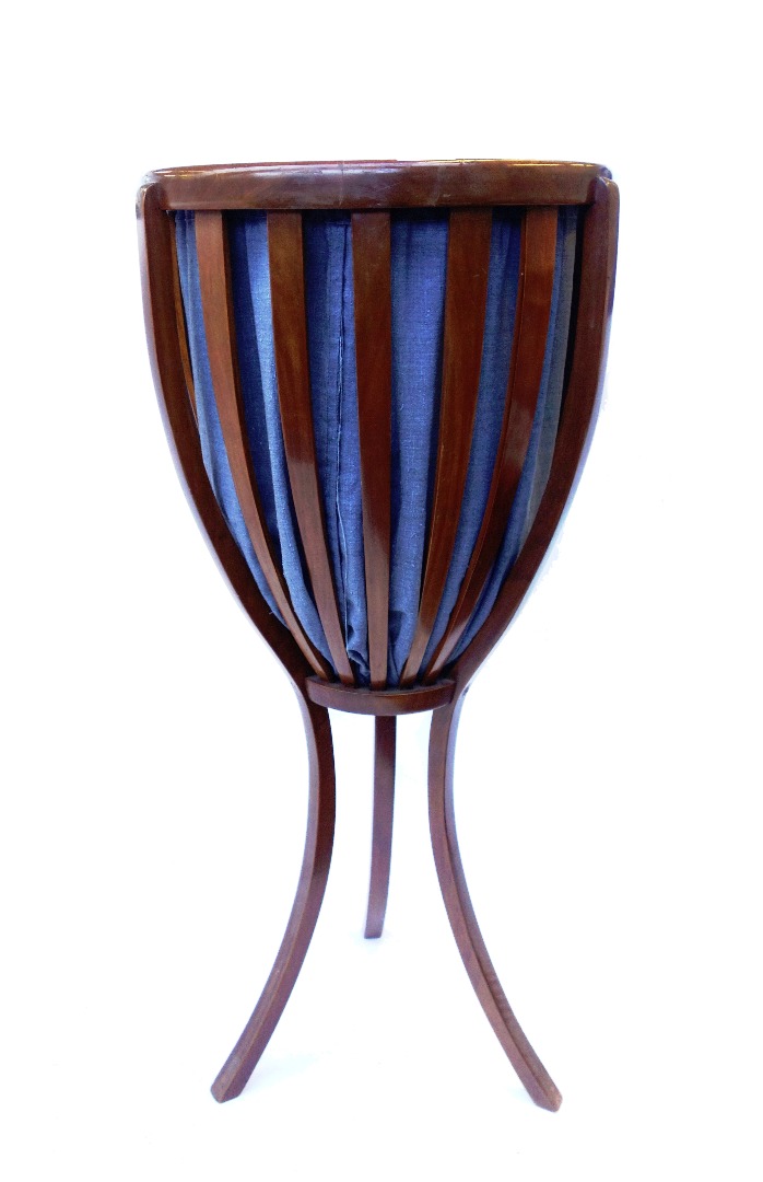 Appraisal: A th century German Biedermeier circular jardiniere with slatted body