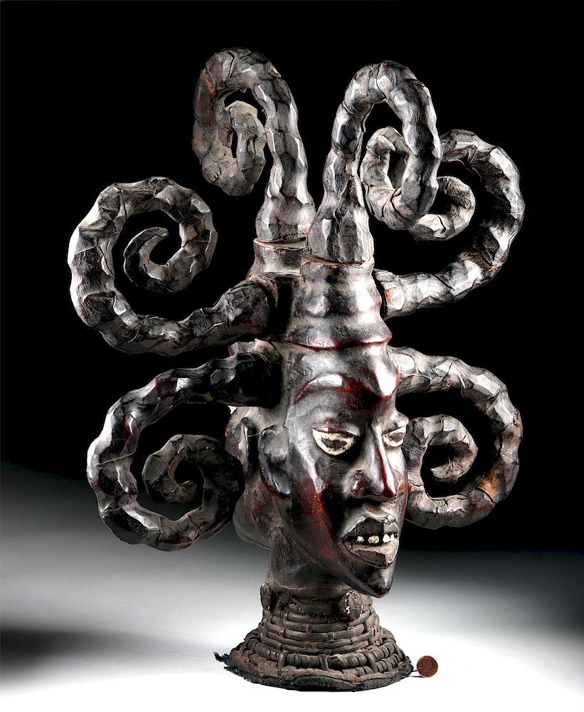 Appraisal: Mid- th C Nigerian Ekoi Wood Janiform Ntoon Headdress West