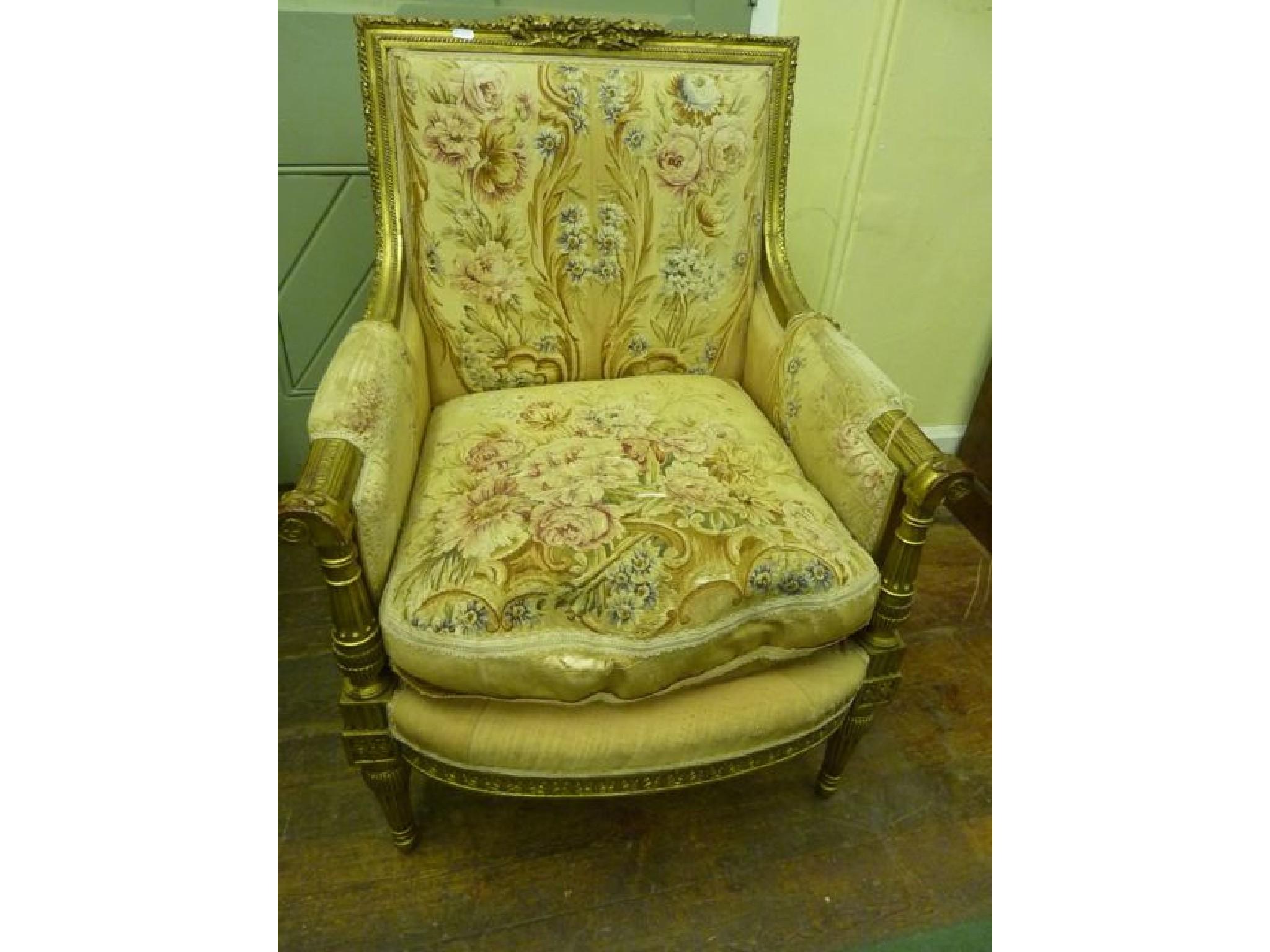 Appraisal: A single French armchair with enclosed arms upon a carved