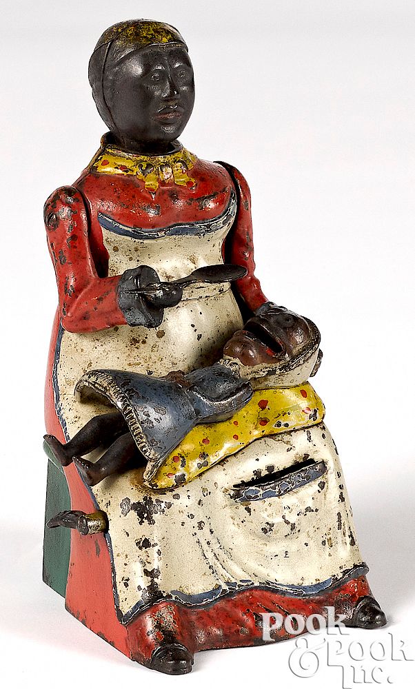 Appraisal: Kyser Rex mammy and child mechanical bank Kyser Rex painted