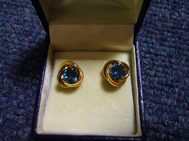 Appraisal: A pair of gold type metal and aquamarine stone set