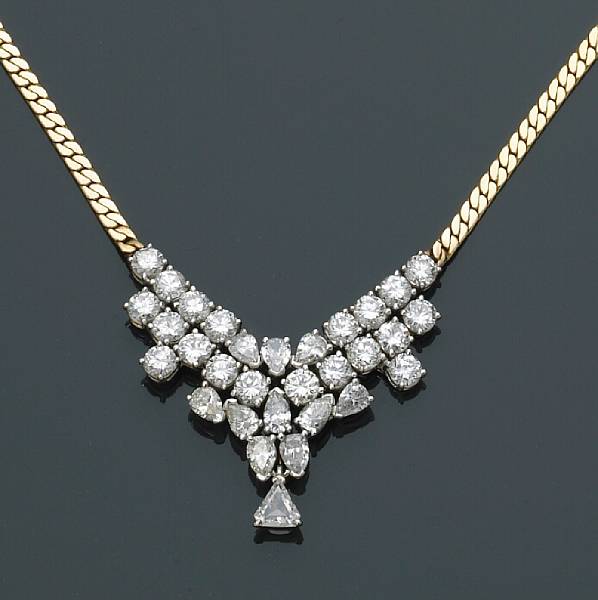 Appraisal: A diamond cluster necklace estimated total diamond weight carats mounted