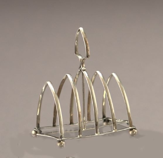 Appraisal: George VI Silverplate Four-Slot Toast Rack second quarter th century