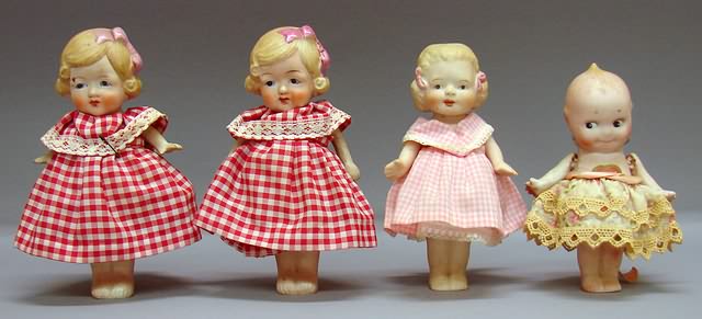 Appraisal: Lot of dolls Pair of pink molded bow dolls and