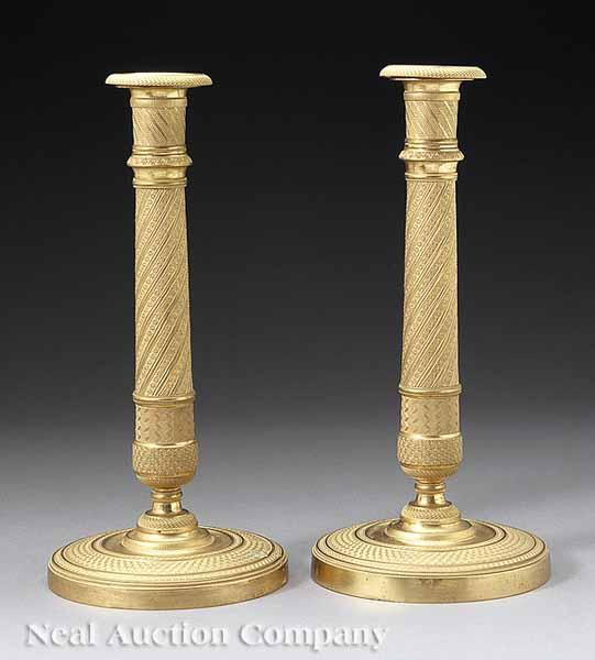 Appraisal: A Pair of Charles X-Style Gilt Bronze Candlesticks cylindrical shafts