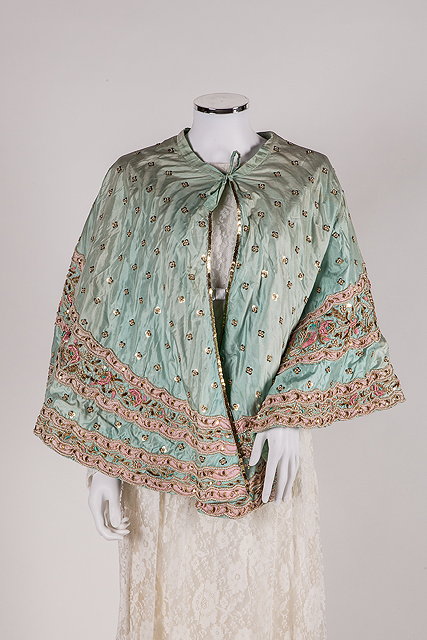 Appraisal: An Indian turquoise beaded and embroidered shawl turquoise silk ground