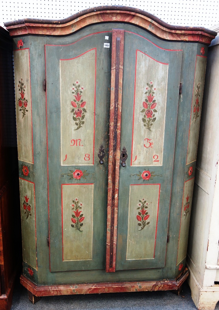 Appraisal: An early th century Tyrolean painted two door armoire dated