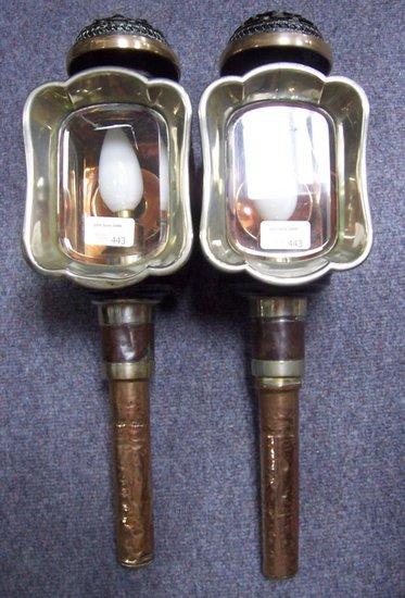 Appraisal: A pair of japanned metal coach lamps with brass mounted