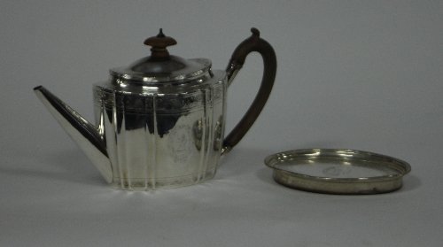 Appraisal: A George III silver teapot R I London of oval