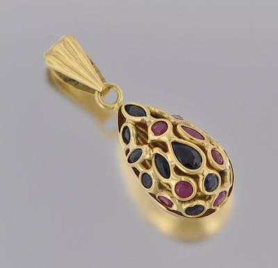 Appraisal: An k Gold Ruby and Sapphire Pendant k yellow gold