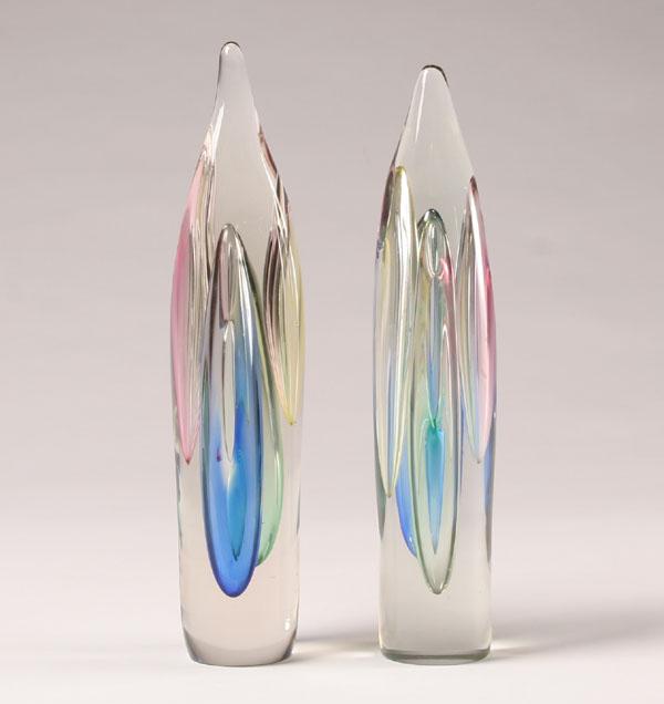 Appraisal: Art glass bullet form sculptures pair Clear with internal cavities