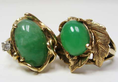 Appraisal: Two Jade Gold Rings one marked K with a leaf