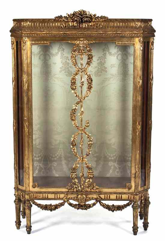 Appraisal: A Louis XVI Style Giltwood Vitrine having ribbon-tied floral crest