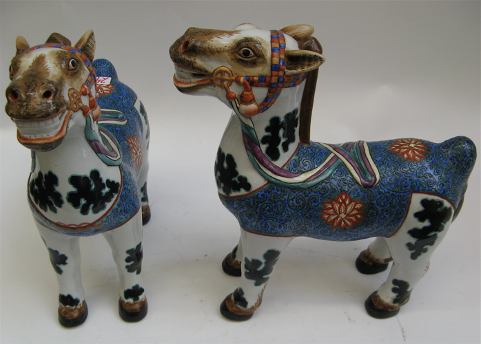 Appraisal: NINE CHINESE ENAMELED PORCELAIN FIGURES hand enameled including two pairs