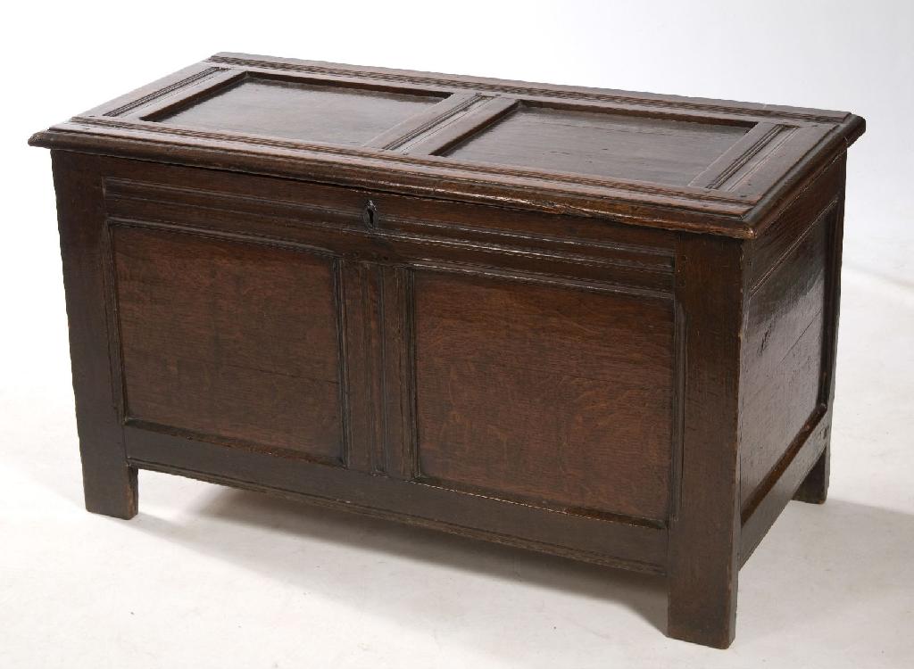 Appraisal: LATE th CENTURY OAK TWO-PANEL COFFER the panelled moulded top