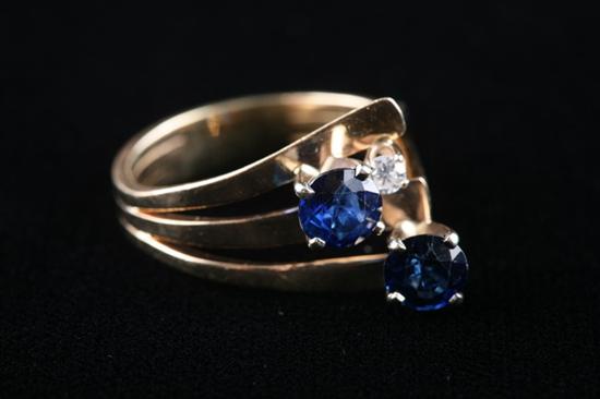 Appraisal: CONTEMPORARY K YELLOW GOLD SAPPHIRE AND DIAMOND RING Two round