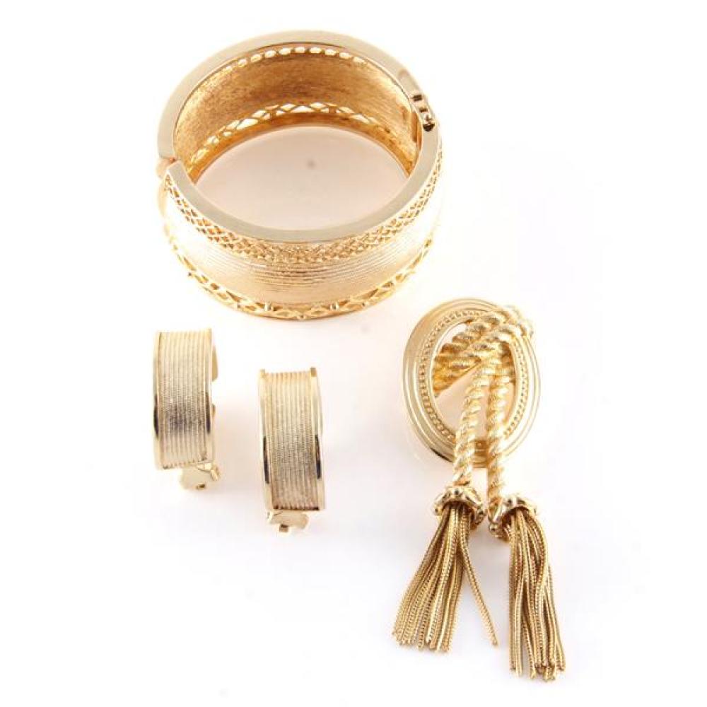 Appraisal: CHRISTIAN DIOR BOUTIQUE TEXTURED GOLD TONE CUFF BRACELET AND HALF