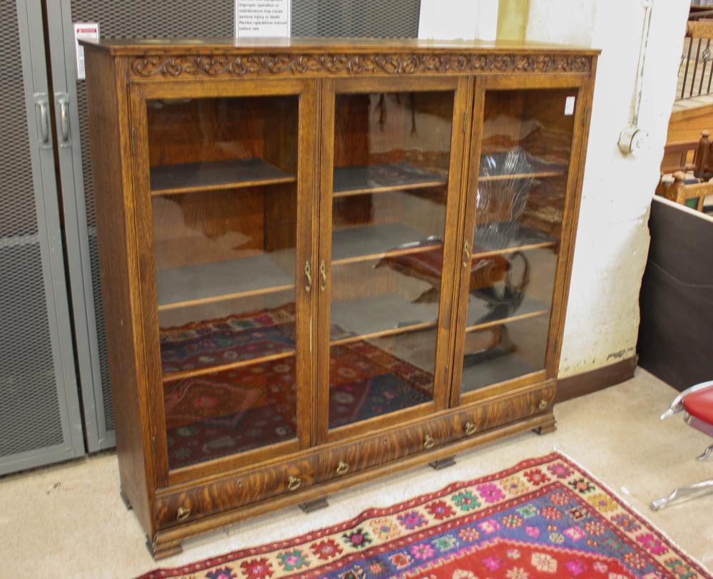 Appraisal: THREE-DOOR CARVED OAK CABINET BOOKCASE American late th early th