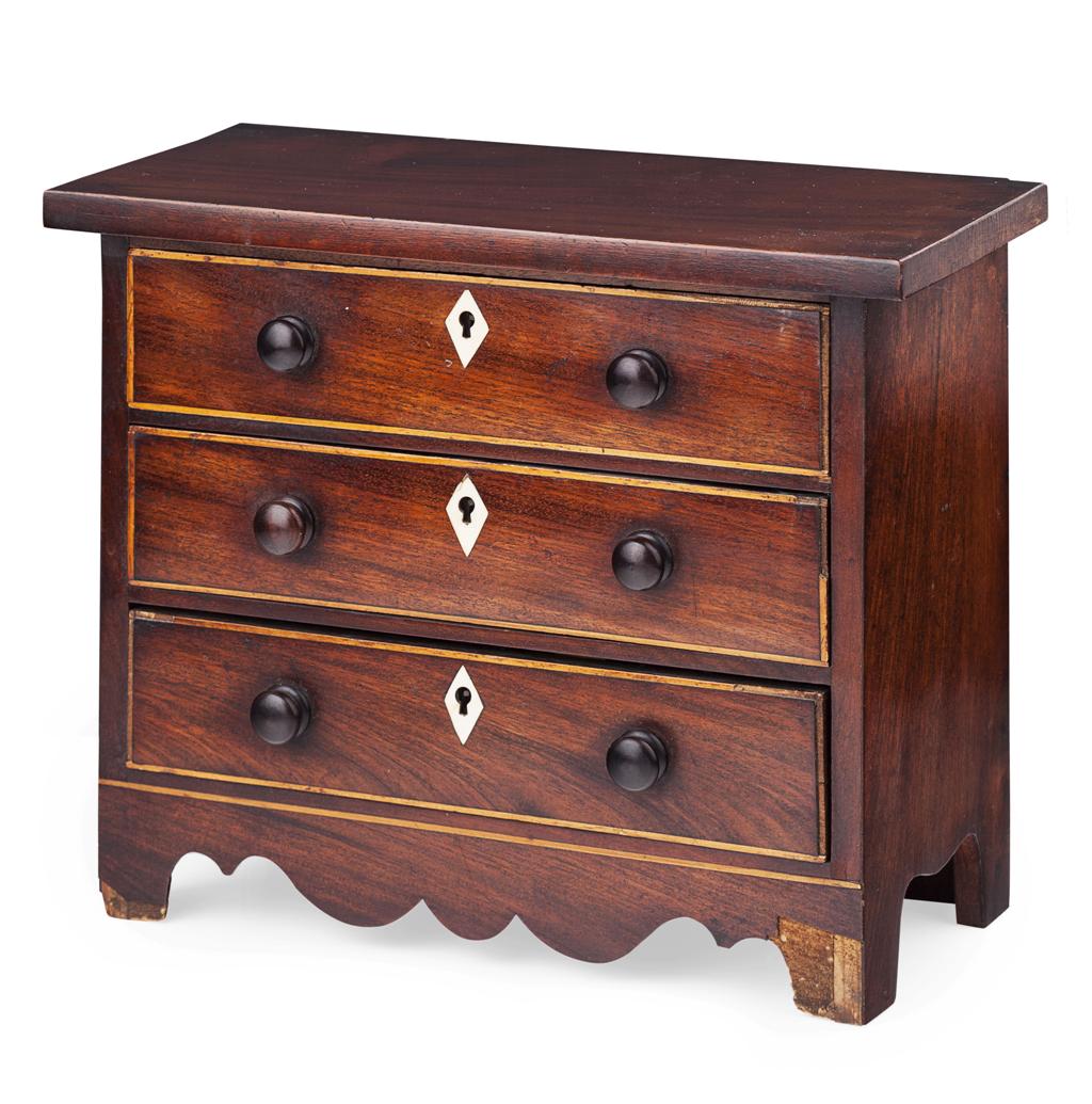 Appraisal: MINIATURE MAHOGANY CHEST OF DRAWERS AND GAMING PIECES TH CENTURY