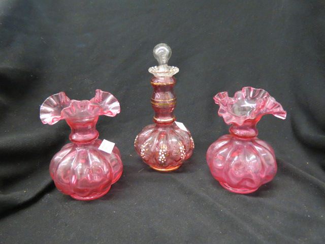 Appraisal: pcs Victorian Cranberry Art Glass cologne bottle and a pair