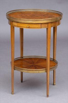 Appraisal: LOUIS XVI-STYLE GILT-METAL MOUNTED KINGWOOD PARQUETRY TWO-TIER TABLE The galleried