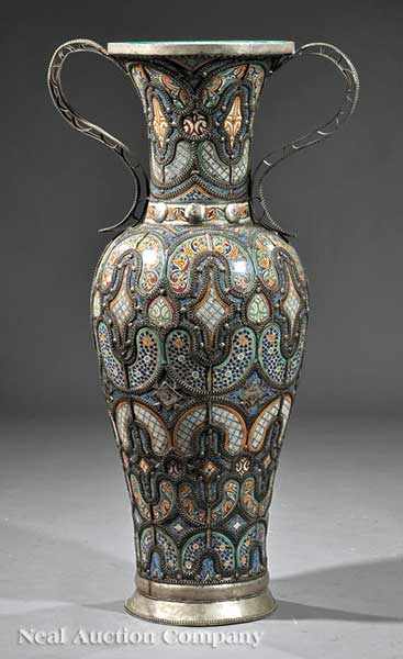 Appraisal: A Monumental Silvered Metal-Mounted and Polychrome Earthenware Vase in the