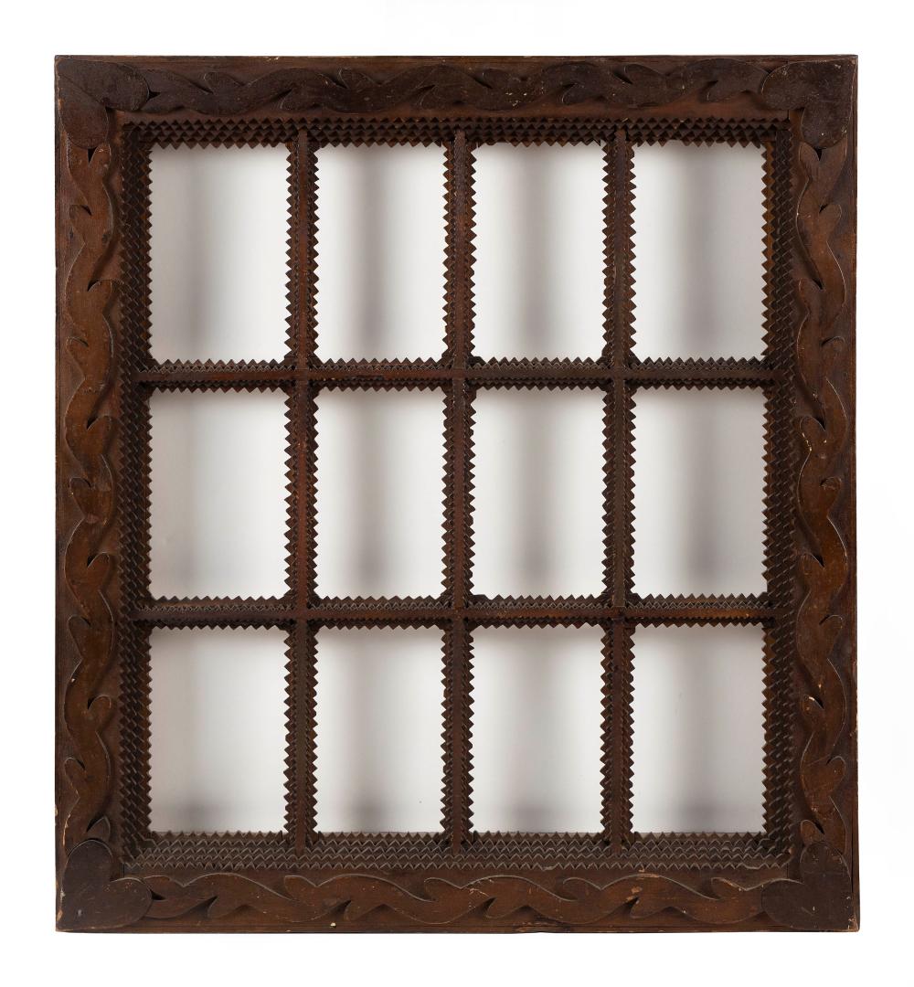 Appraisal: WONDERFUL TRAMP ART PICTURE FRAME WITH TWELVE APERTURES TH CENTURY