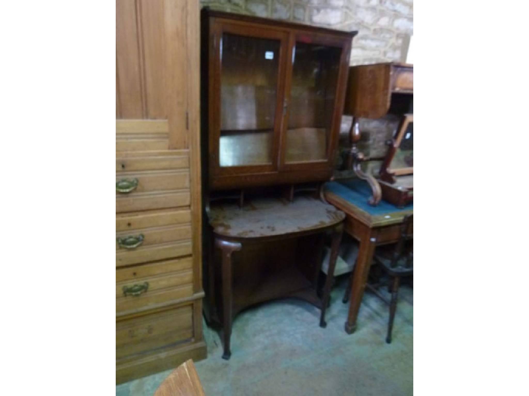 Appraisal: An unusual oak bookcase writing table combination in the Arts