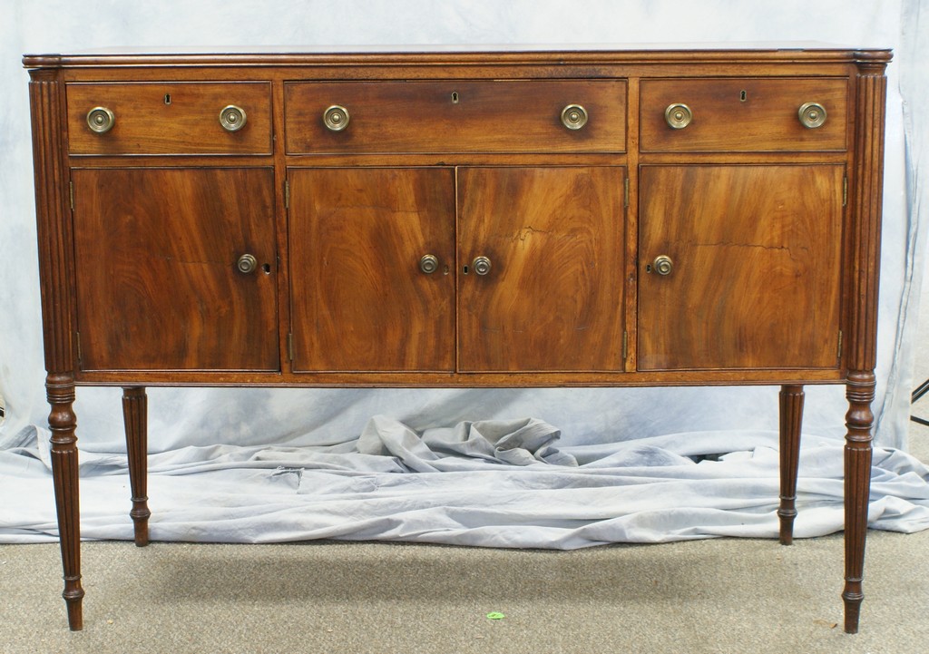 Appraisal: Hepplewhite style mahogany side board center drawer fitted for silver