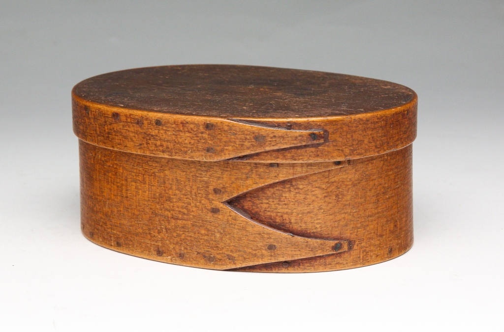 Appraisal: Second half th century Oval bentwood box with finger seams