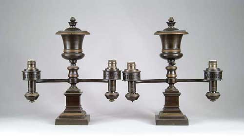 Appraisal: PAIR OF TWO BRANCH BRONZE ARGON LAMPS Plaque marked Manufactured