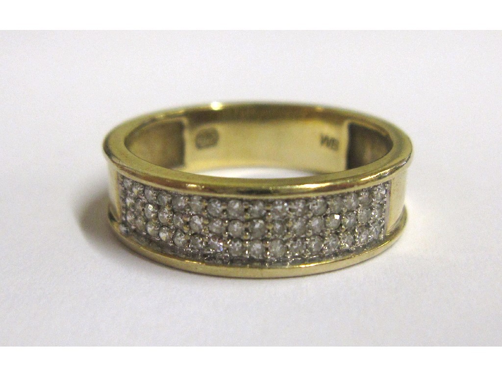 Appraisal: Nine carat gold diamond half hoop ring