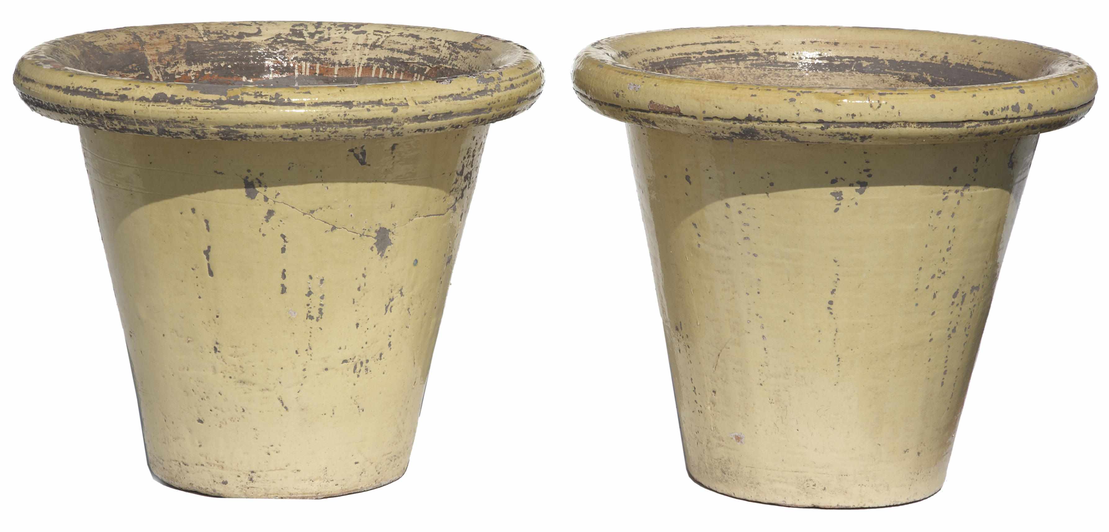 Appraisal: A pair of glazed earthenware jardinires height in cm diameter