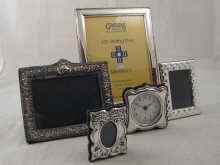 Appraisal: A silver photo frame x cm with Millennium hallmark in