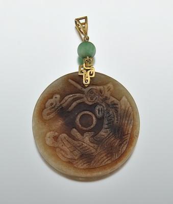 Appraisal: A Carved Jade Disk Pendant with k Gold Mounting One