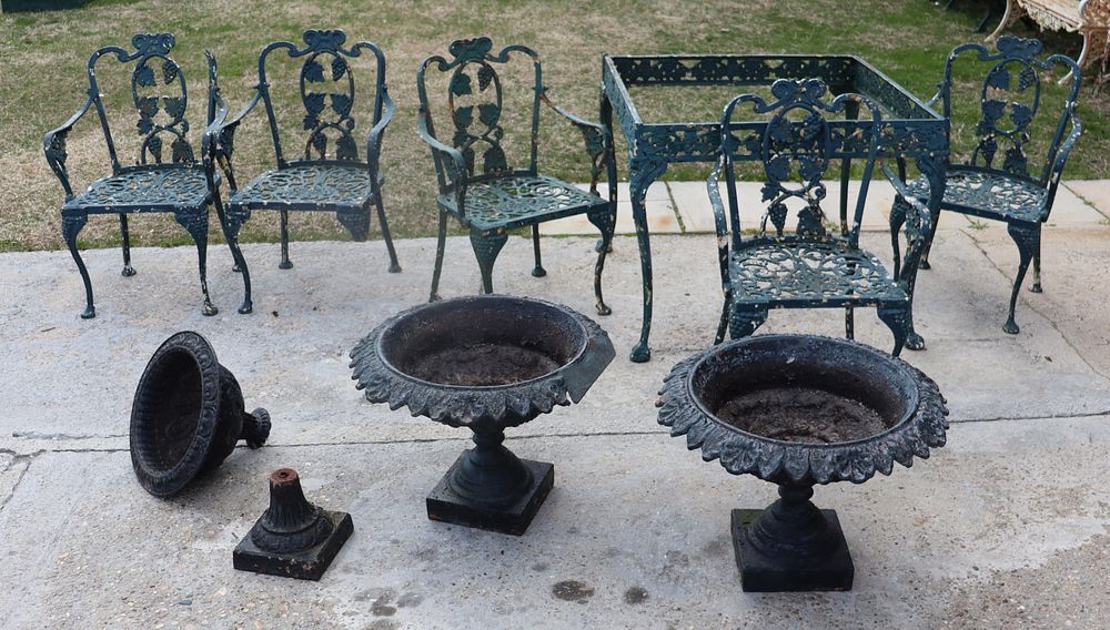 Appraisal: Antique Heavy Iron Table Chairs and Urns The lot is