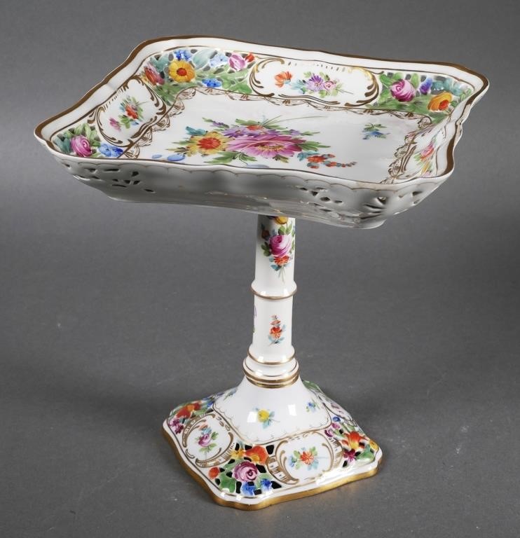 Appraisal: Porcelain stand with hand painted floral motif with pierced corners