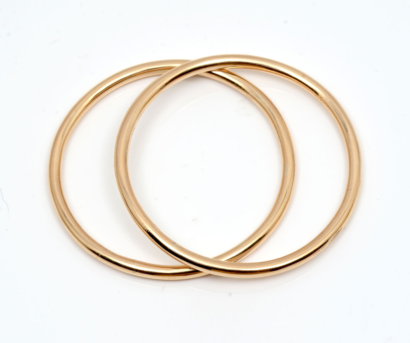 Appraisal: PAIR OF K SOLID GOLD BANGLES Great feel to these