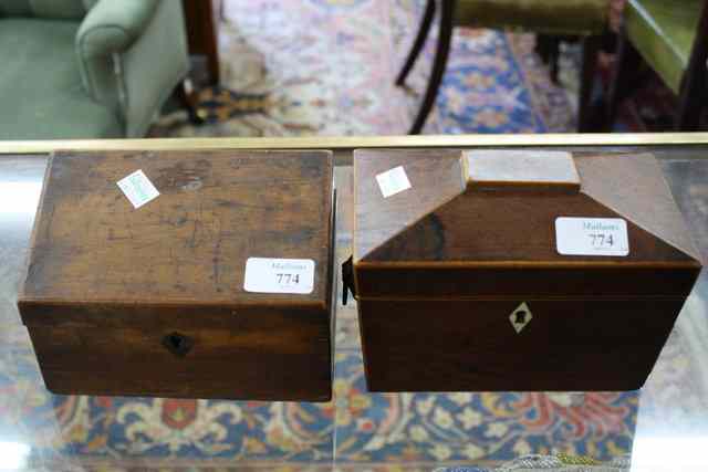 Appraisal: A VICTORIAN ROSEWOOD TEA CADDY of sarcophagus form with fitted