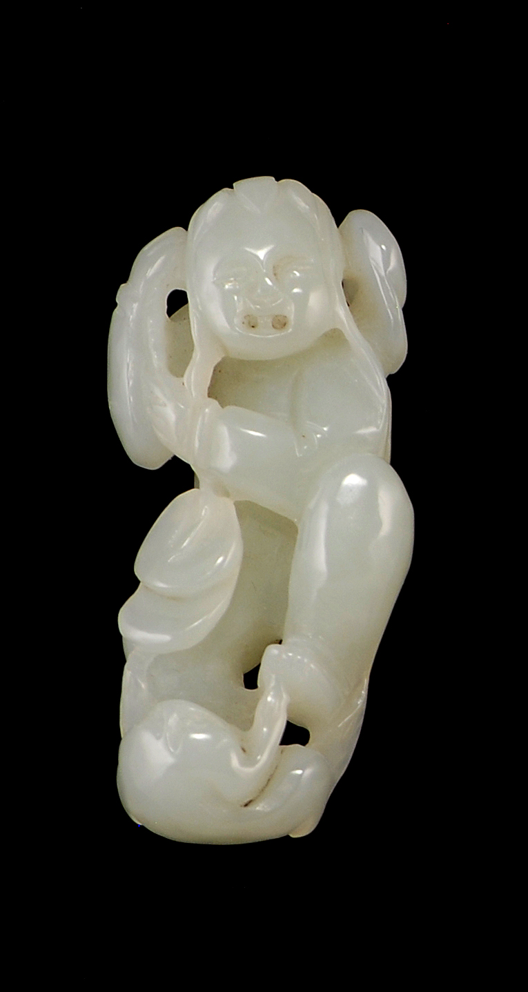 Appraisal: WHITE JADE CARVING In the form of Liu Hai with